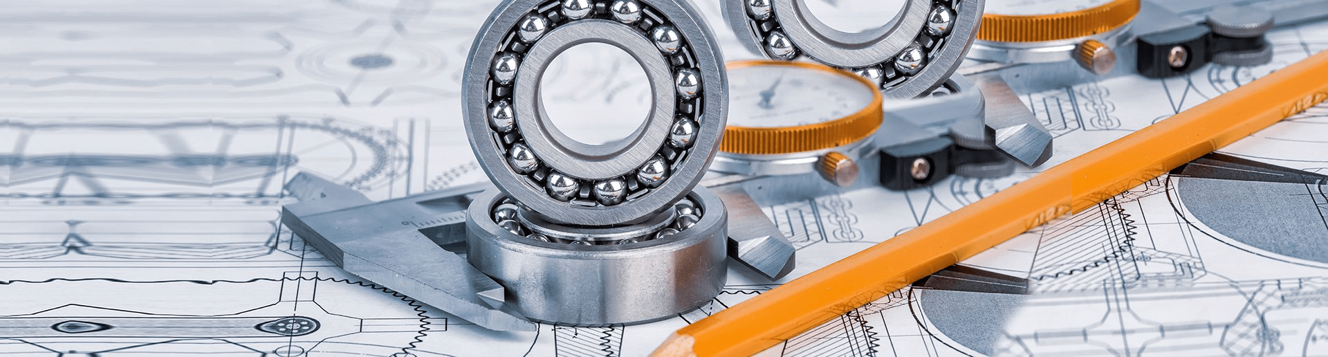 A person writing on a notepad at a desk.
